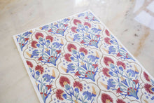 Load image into Gallery viewer, Picture of whimsical Mediterranean rice decoupage paper in red blue and yellow