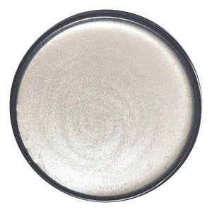 Drop of wise owl glaze in opalescent pearl on white background