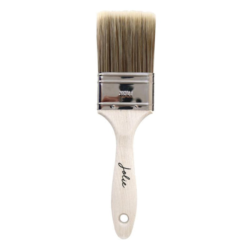 Jolie flat brush with wood handle on white background 